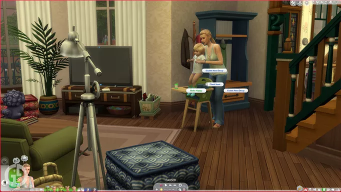 Image of a Toddler being put into a high chair in the sims 4