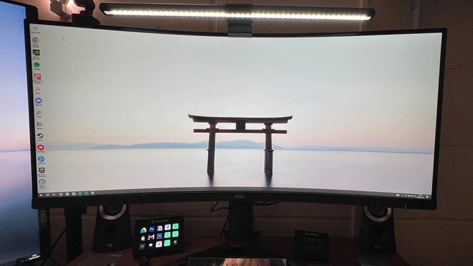 Quntis Light Bar Pro+ on top of an ultrawide monitor