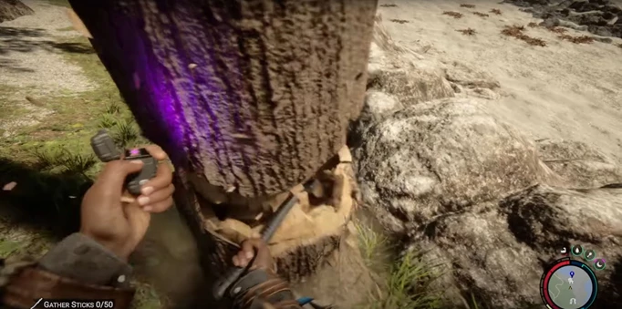 Swinging an axe at a tree in Sons of the Forest