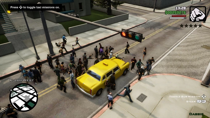 A crowd of people surround a yellow car.