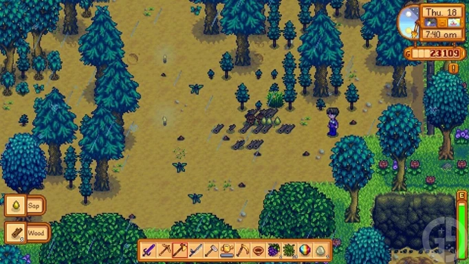 A pile of wood waiting to be collected in Stardew Valley