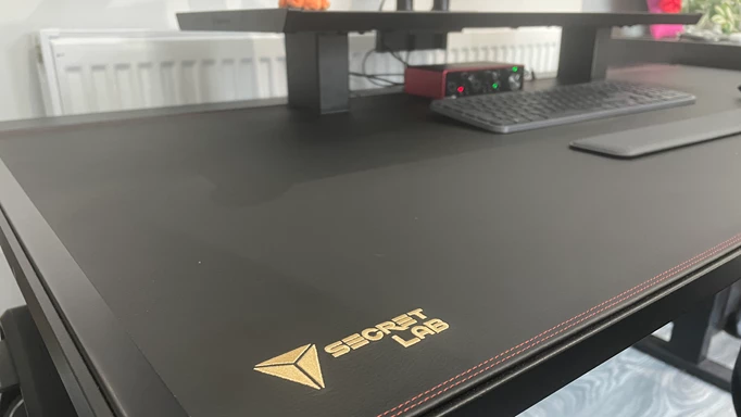 A look at the corner of MAGNUS Pro desk, featuring its desk riser.