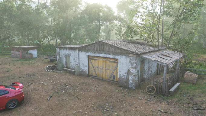 A barn in a misty jungle.