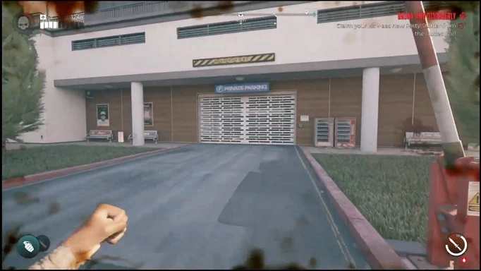 an image of Dead Island 2 gameplay showing the parking garage shutters at the Serling Hotel in Ocean Avenue