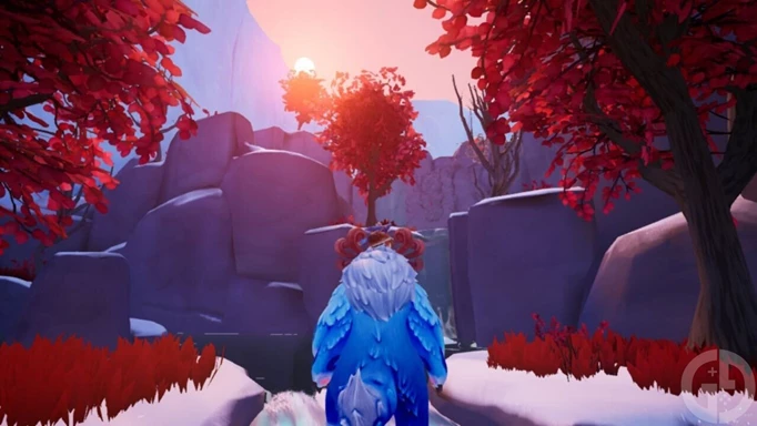 Nunu and Willump look out at an assortment of red trees against a snowy backdrop in Song of Nunu