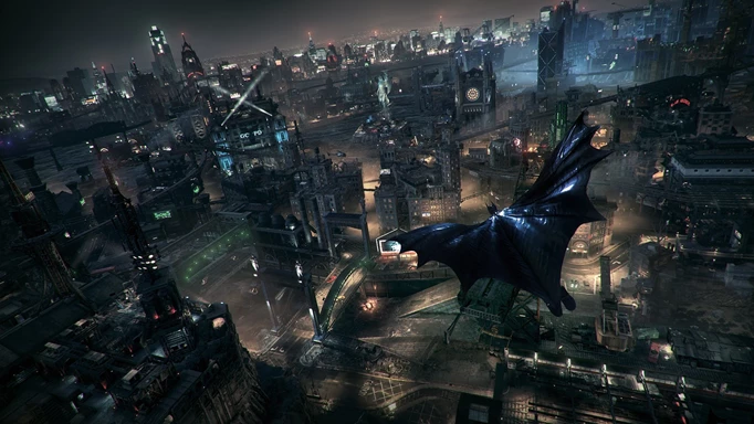 Batman glides over a gloomy Gotham City in Batman: Arkham Knight