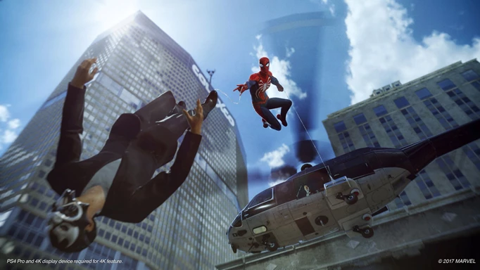 Spider-Man fires a web at an enemy while falling from a helicopter in Marvel's Spider-Man