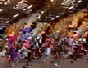 tekken-8-arcade-quest-people-in-an-arcade.jpg