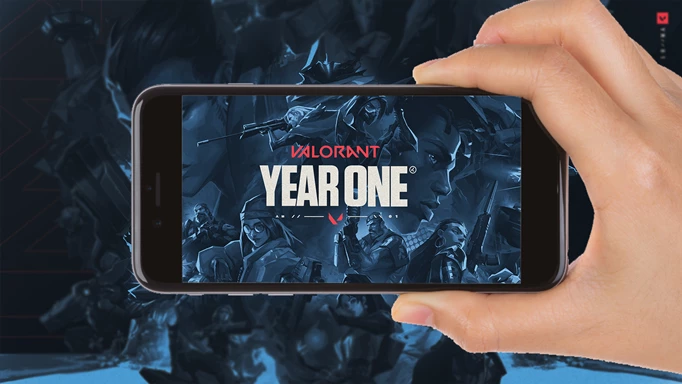 Key art of a mobile phone of with VALORANT and year one text on it