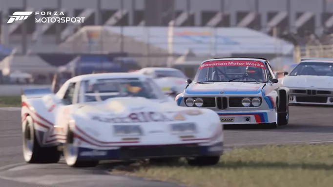 A BMW race car heading into a corner in Forza Motorsport