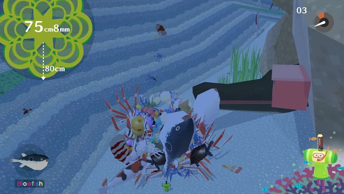 Screenshot of rolling underwater in We Love Katamari Reroll