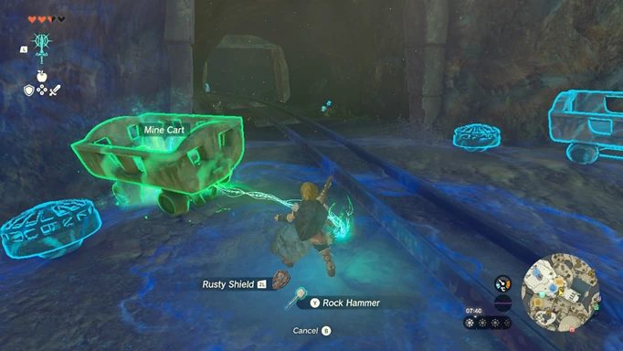 Link using the Fuse function on a mine-cart in The Legend of Zelda: Tears of the Kingdom