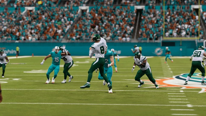 Madden 24 gameplay of players on a pitch
