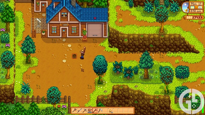 Image of my character using the Hoe in the Mountains in Stardew Valley