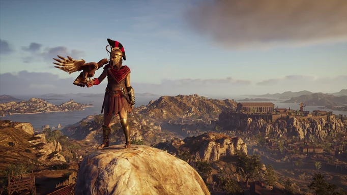 Kassandra holding an eagle in Assassin's Creed Odyssey