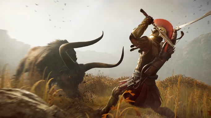 Kassandra attempts to strike a charging bull, one of the best games like Red Dead Redemption 2