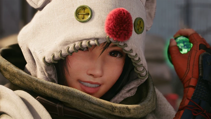 Yuffie Kisaragi as she appears in Final Fantasy 7 Remake Intergrade - She is wearing a Moogle costume and holding green Materia