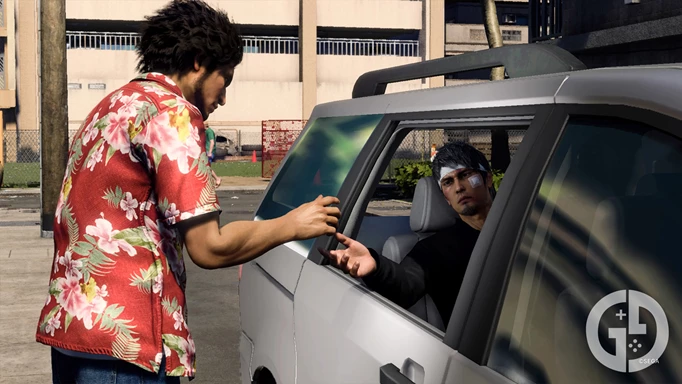 Ichiban shaking Kiryu's hand as Kiryu leaves in a car