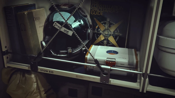 A screenshot from Starfield featuring items on a shelf in a ship