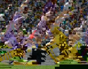 ea-fc-24-reus-slide-tackle.jpg