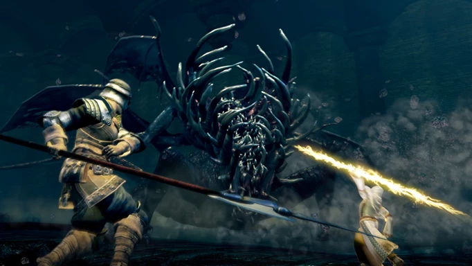 Key art from Dark Souls with two characters attacking the Gaping Dragon boss