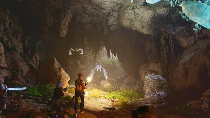 Ark Survival Ascended key art showing players exploring caves