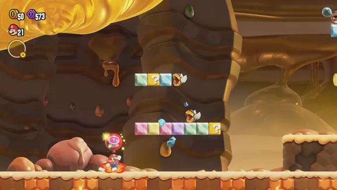 Mario collecting a power-up in Super Mario Wonder
