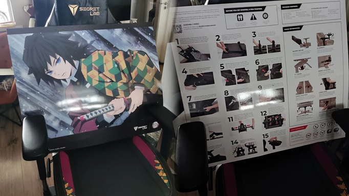 The instruction sheets for the Secretlab TITAN Evo, which bear instructions on how to build and use the chair, as well as a large poster of Giyu
