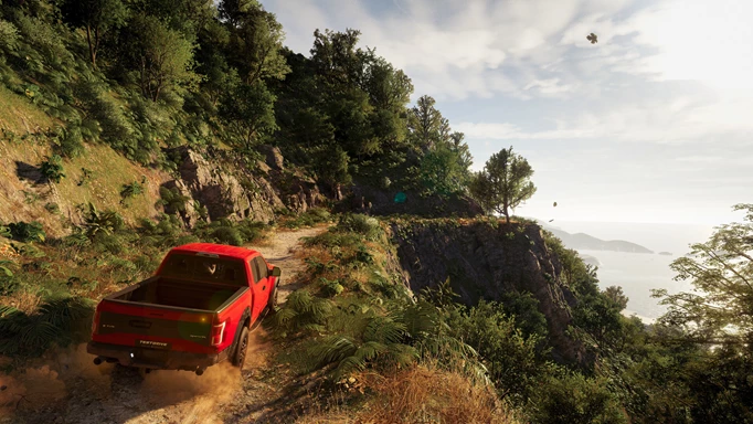 Test Drive Unlimited Solar Crown screenshot showing a car driving on a mountain track