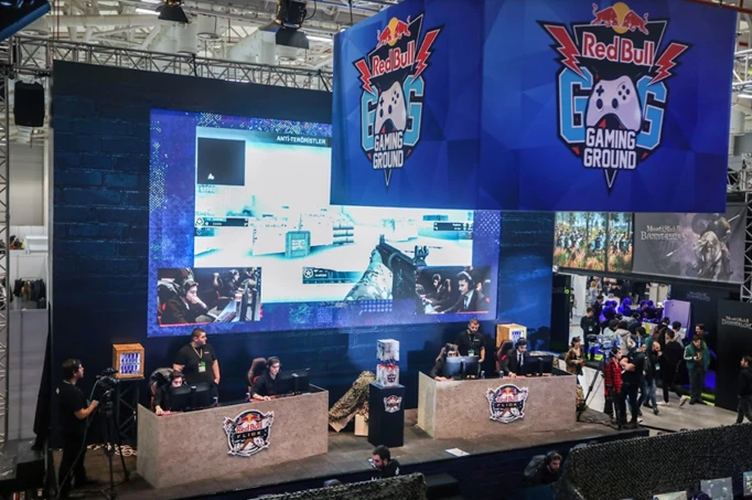 Players at a CS:GO tournament face off on stage during a Red Bull invitational.