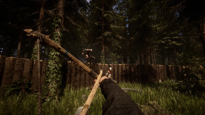 Aiming a bow at enemies climbing over a wall in Sons of the Forest