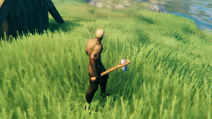 Valheim flint: A player wielding a flint axe
