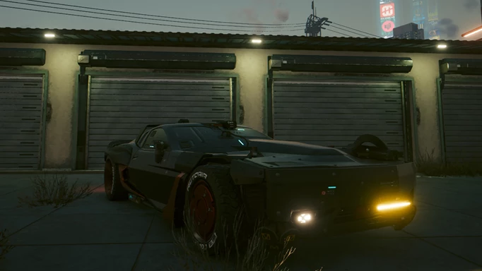 A car outside a garage in Cyberpunk 2077