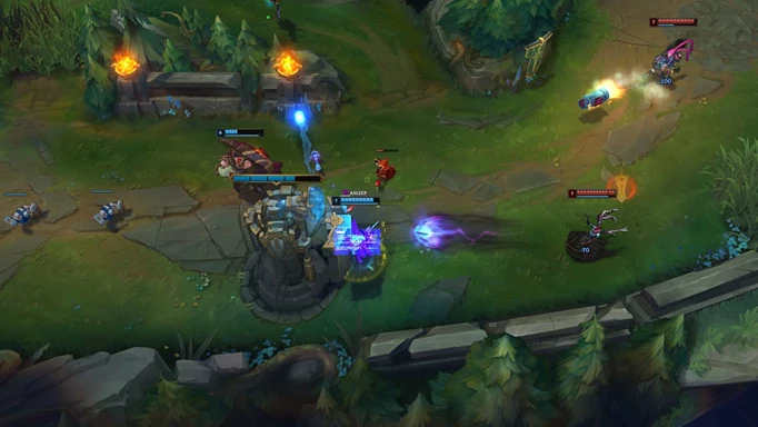Characters battling in League of Legends