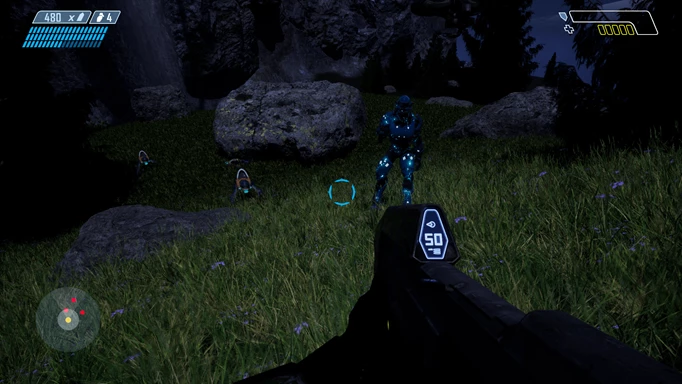 The player looks to oncoming enemies beside some gloomy rocks in ArcSin Jesse's Halo: Combat Evolved remake.