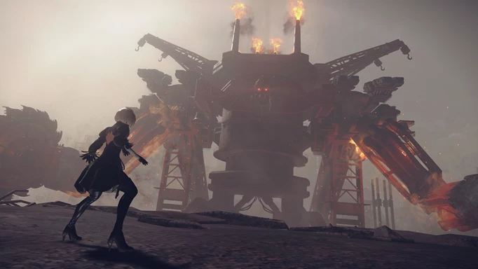 2B stares at a colossal mech in Nier Automata, one of the best games like Armored Core
