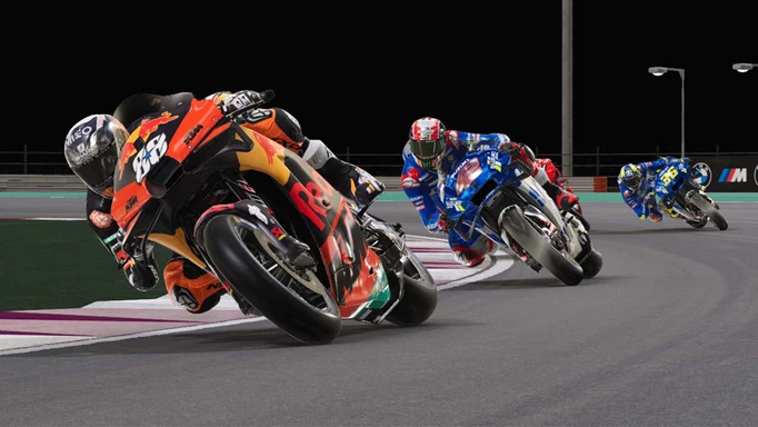 Three motorbikes ride down a track in MotoGP 22