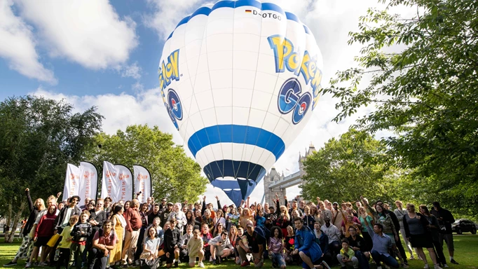 Pokemon GO players and Niantic members in front of the Pokemon GO Balloon for GO Fest 2023: London
