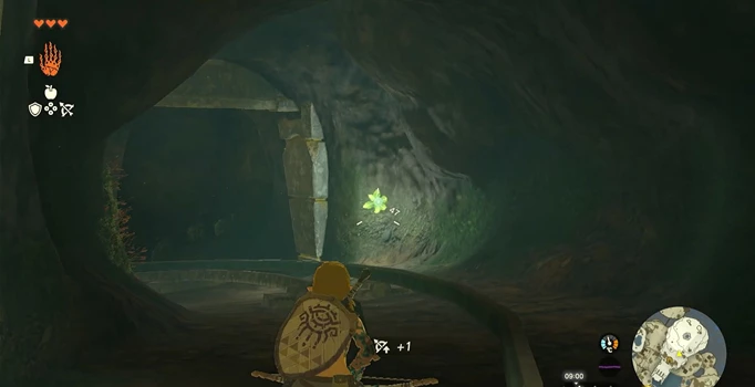 an image of Link shooting a Brightbloom Seed into the wall to light up a dark area in Zelda Tears of the Kingdom