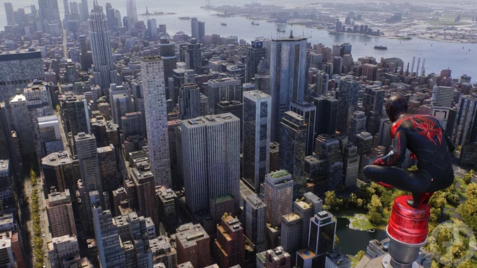 Miles looks over New York in Spider-Man 2, where you can find an assortment of Hero Tokens