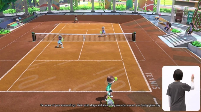 A Sportsmate prepares to serve in Nintendo Switch Sports tennis.