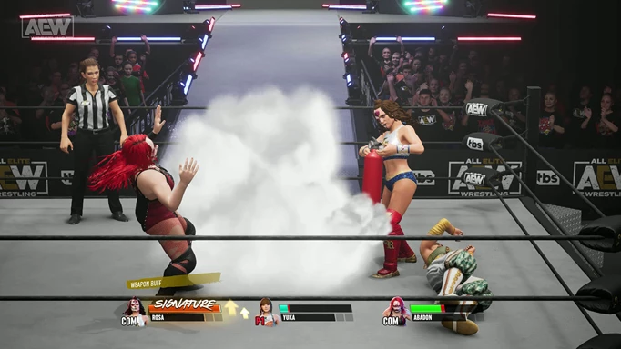 AEW Fight Forever gameplay screenshot of Thunder Rosa, Abaddon, and Yuka Sakazaki, where Thunder Rosa is using a fire extinguisher